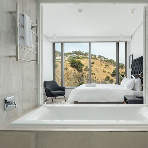 Sneak away for an early evening bubble bath and soak up the mountainscapes