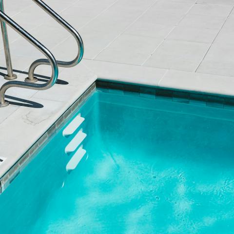 Take a refreshing dip in the communal pool