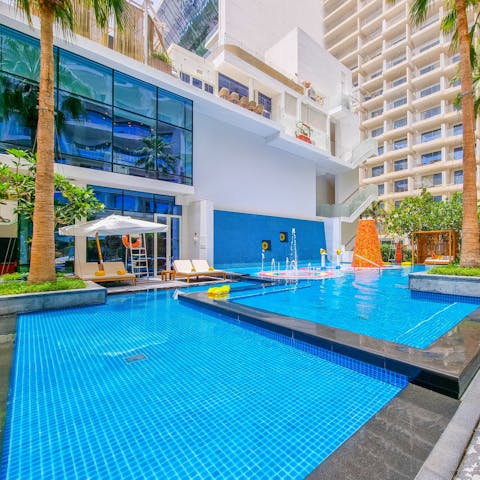 Dive into the resort's shared pool for a morning swim