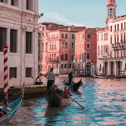 Take a gondola ride through Venice's backwaters at sunset