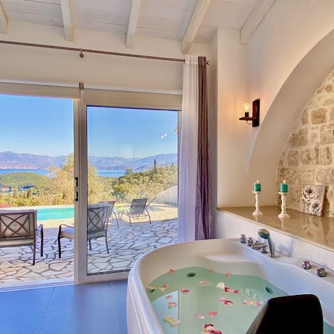 Pour a glass of bubbles and enjoy views across the Albanian mountains from your in-bedroom bathtub