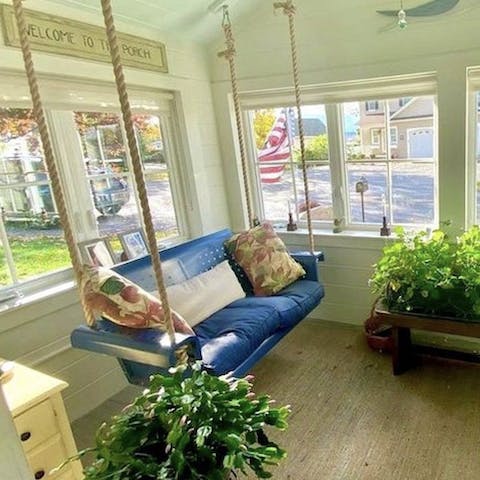 Kick back and relax in the cosy swing chair on the porch 