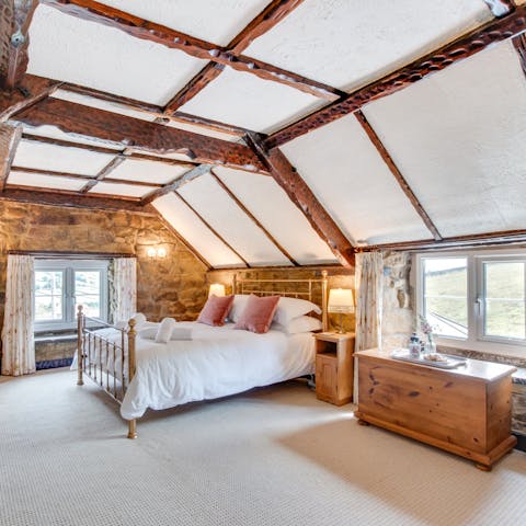 Drift off to sleep beneath the traditional wooden beams