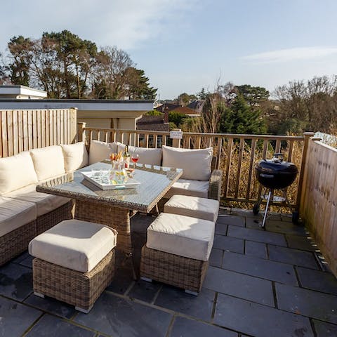 Watch the sun dip beneath the horizon while seated in the south-facing garden