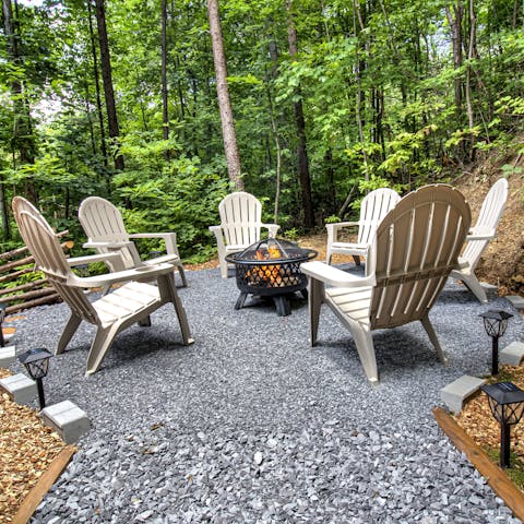 Toast marshmallows around the fire pit with loved ones