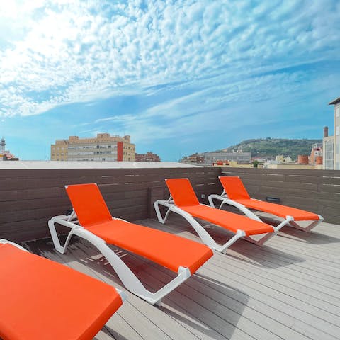 Soak up the Barcelona sun on the shared roof terrace