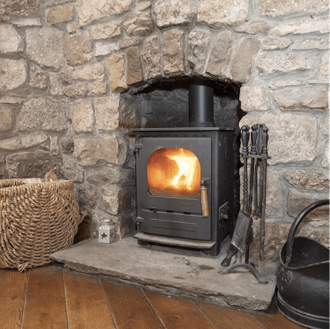 Throw a log on the wood-burner and get toasty in front of the fire