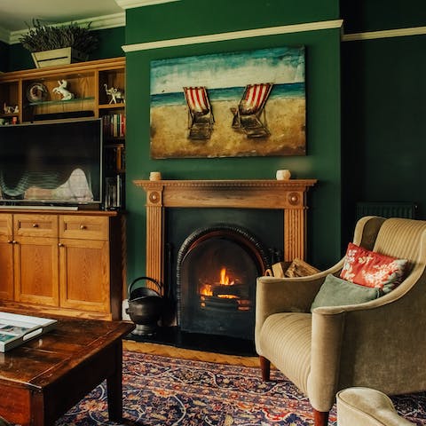 Curl up in front of the fire with a book in hand on cold days in the countryside 