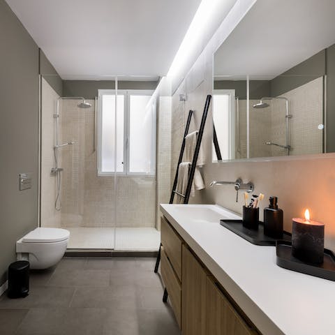 Relax under the rainfall shower after a day of Madrid sightseeing