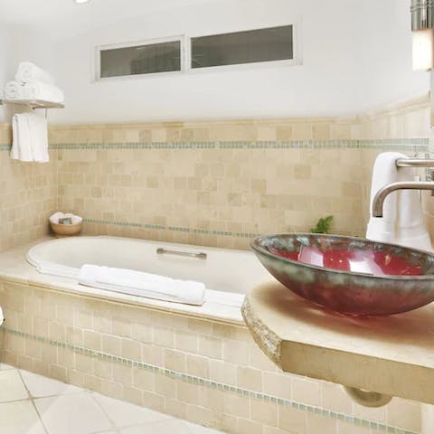 On cooler evenings, soak in the luxurious bathtub 