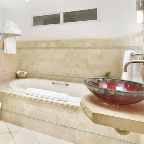 On cooler evenings, soak in the luxurious bathtub