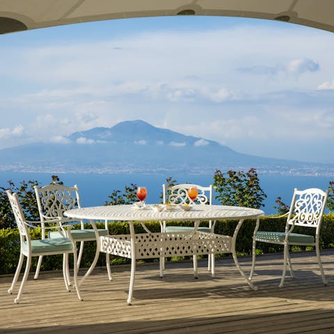 Enjoy a cocktail or alfresco meal with spectacular ocean and mountain views