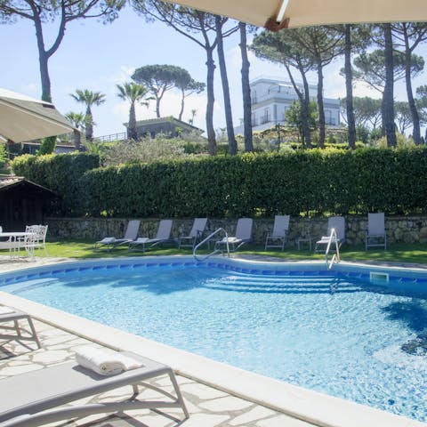 Bask in the sunshine from the private outdoor swimming pool