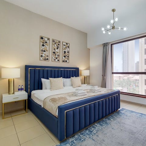 Sink into your plush bed for a peaceful night's sleep amongst the city vistas
