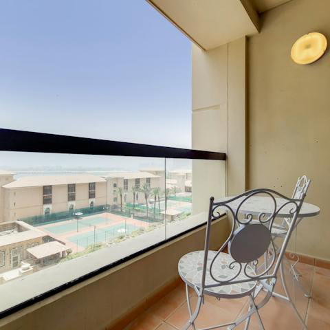Spend mornings with coffee and a view on your private balcony