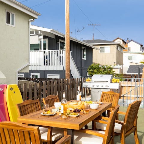 Laugh with friends over a barbecue on the terrace