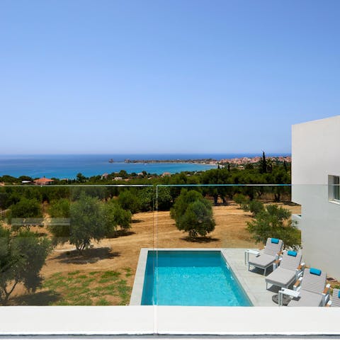 Take in views of Methoni and the sea from the main bedroom's balcony