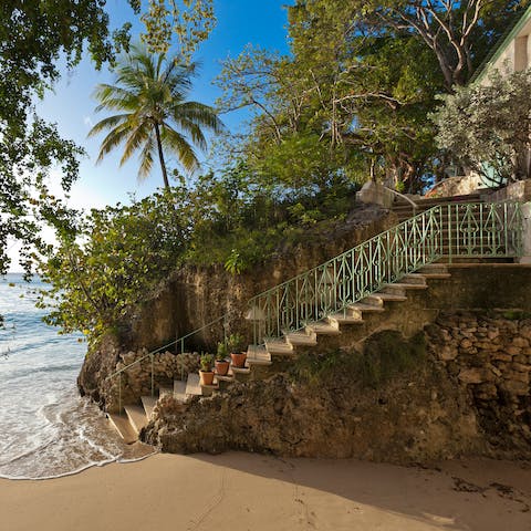 Make your way down the steps to your own private cove