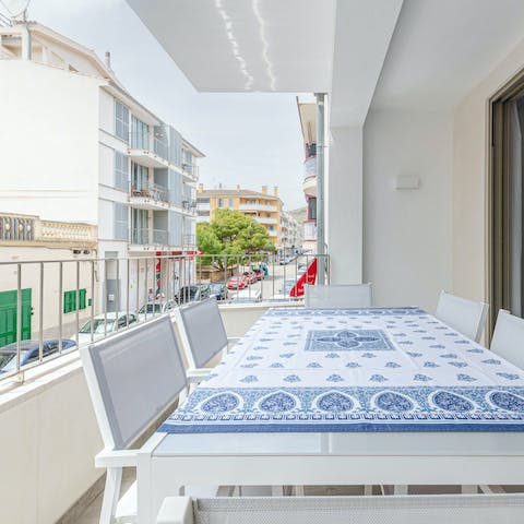 Enjoy tapas washed down with sangria on the private balcony
