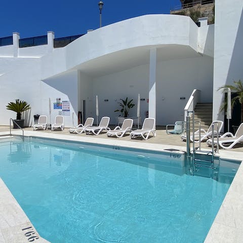 Lounge by the communal pool or go for a dip in the clear blue waters under the hot Nerja sun