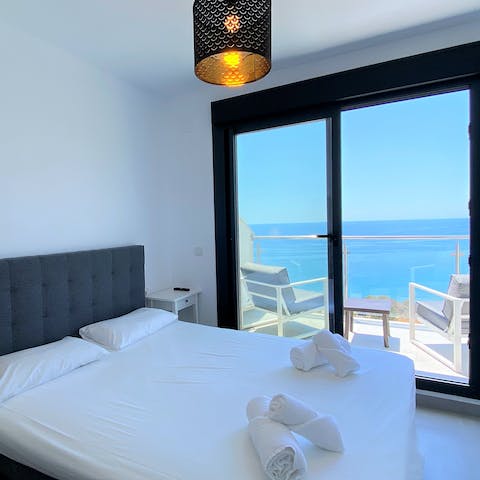 Roll out of bed and onto your own private balcony where you can watch the waves roll by