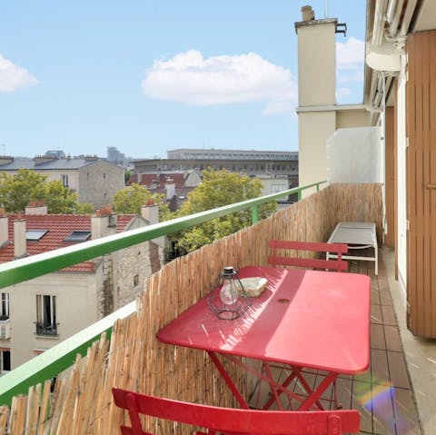 Take in the neighbourhood views with a glass of wine on the balcony