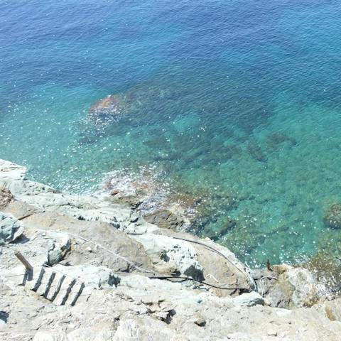 Head down the steps to enjoy direct access to the Aegean Sea