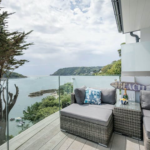 Bask in the sweeping views across the estuary on the balcony 