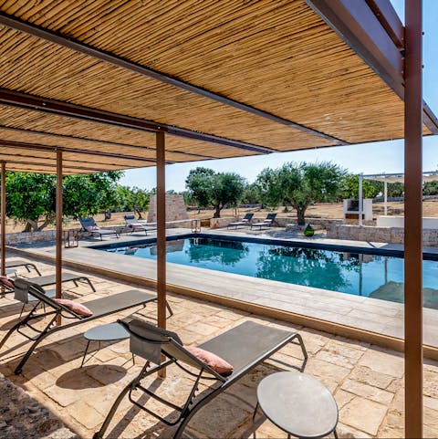 Soak up the sun beside the pool, or relax in the shade – there's plenty of outside space