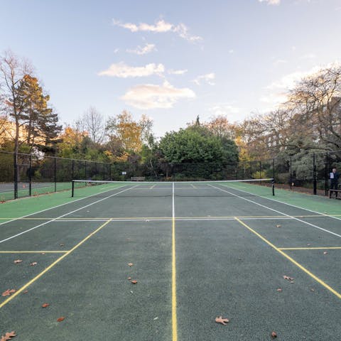 Practice your serve on the communal tennis court