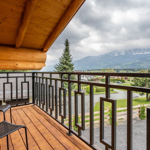 Gaze out across the mountains from your bedroom balcony