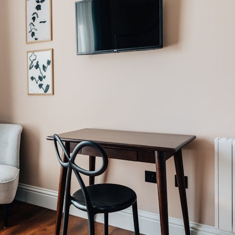 Catch up on work at the main bedroom's desk space