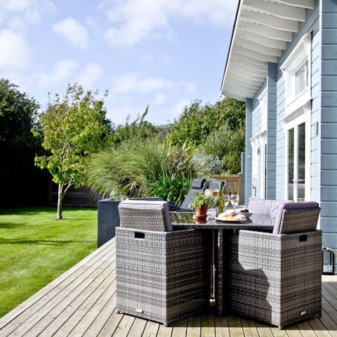 Enjoy an alfresco meal on the deck or relax in the sun on a lounger,