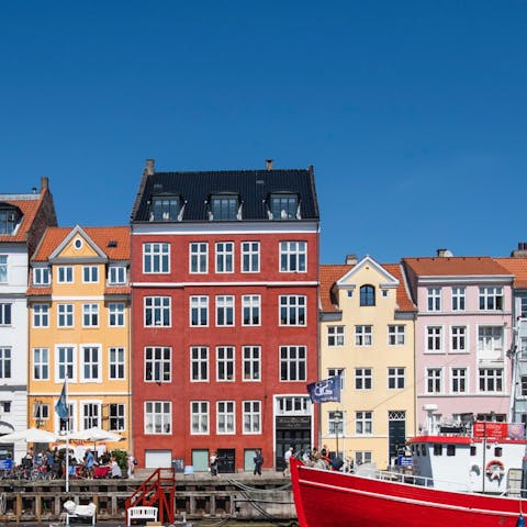 Explore Copenhagen's iconic Nyhavn area, just ten minutes away by metro