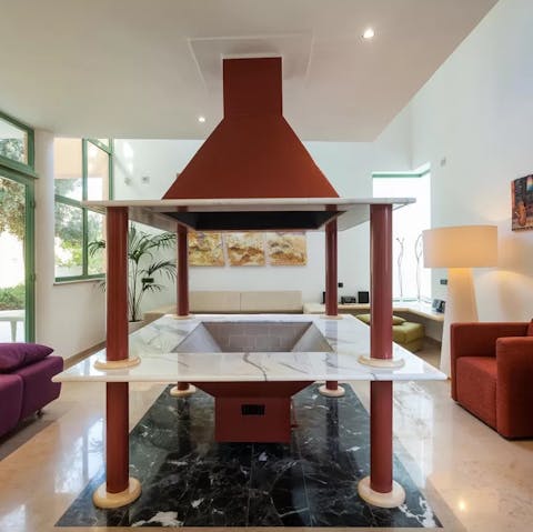 Admire a contemporary interior design with a freestanding fireplace