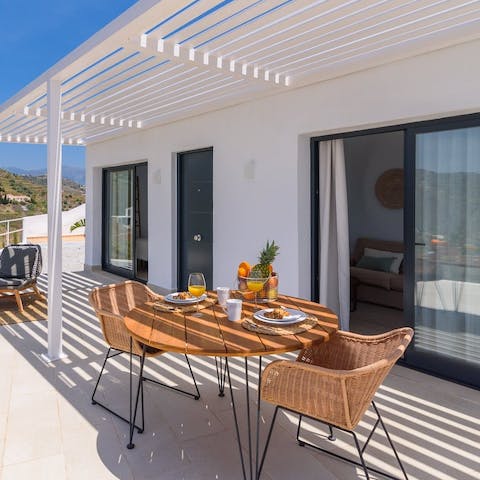 Enjoy breakfast or tapas alfresco at the outdoor dining table