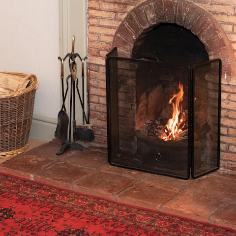 Cosy up in front of the open fire on cooler evenings
