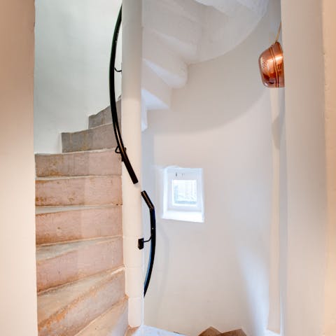 Climb the ancient spiral staircase