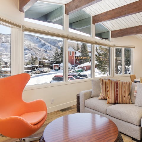 Admire the panoramic views of the mountains from the living room