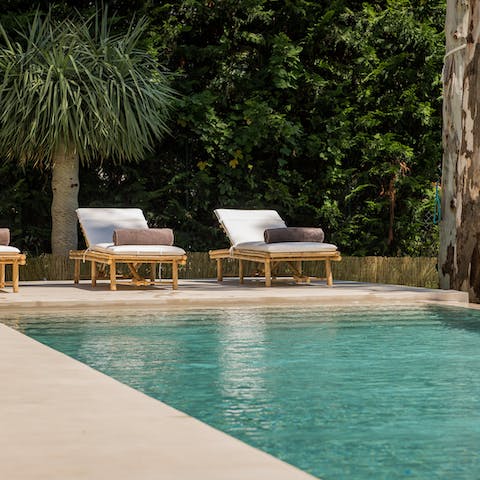 Bask in the serenity of the beautiful gardens whilst lounging by the pool
