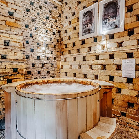 Step into the steaming hot tub and let yourself relax