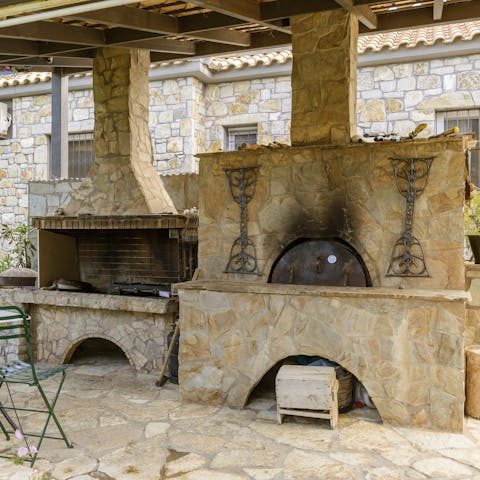 Try your hand at cooking some Greek delicacies in the outdoor kitchen 