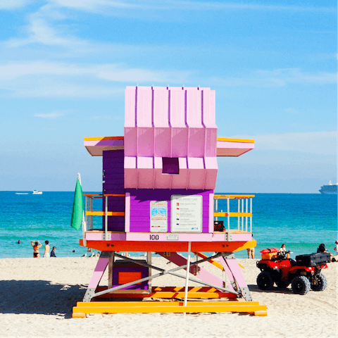 Drive four miles across the causeway to the iconic Miami Beach