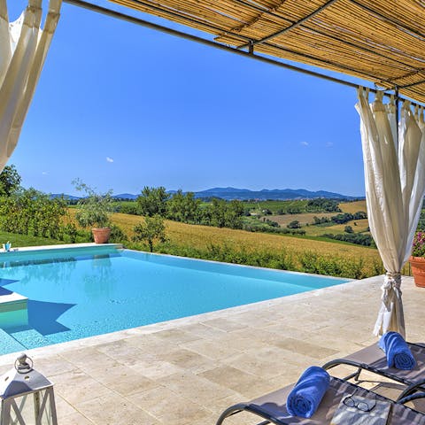 Take a dip in the infinity pool and soak up the hot Italian sun