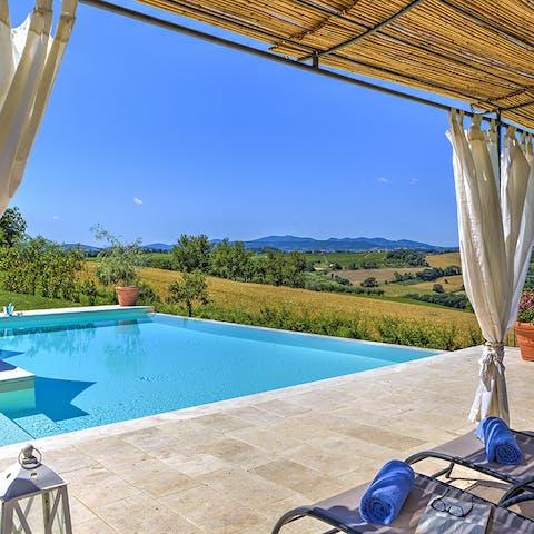 Take a dip in the infinity pool and soak up the hot Italian sun