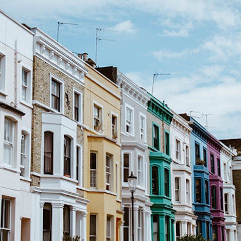 Stroll amongst the pretty pastel-coloured buildings of Notting Hill