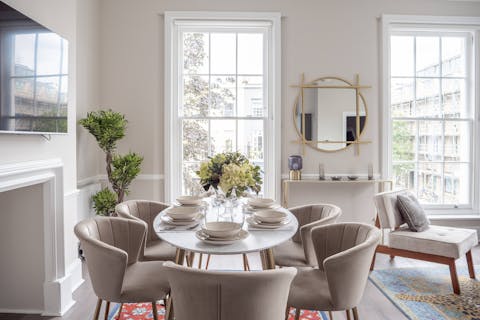 Gather for a family meal in the light-filled living area