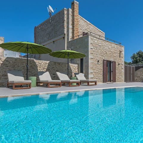Escape the heat in the private pool and catch a tan on the sun loungers