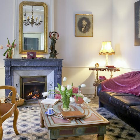 Enjoy cosy nights in by the ornate fireplace, with a glass of wine in hand