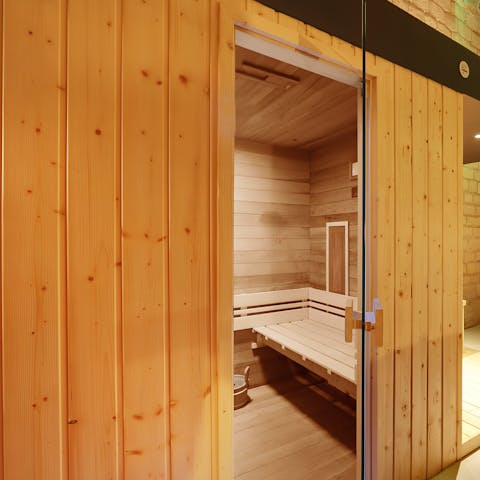 Make cocktails at the bar or relax in the sauna